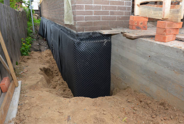 SJ Waterproofing Pros technician performing targeted Waterproofing assessment in Pomfret, MD